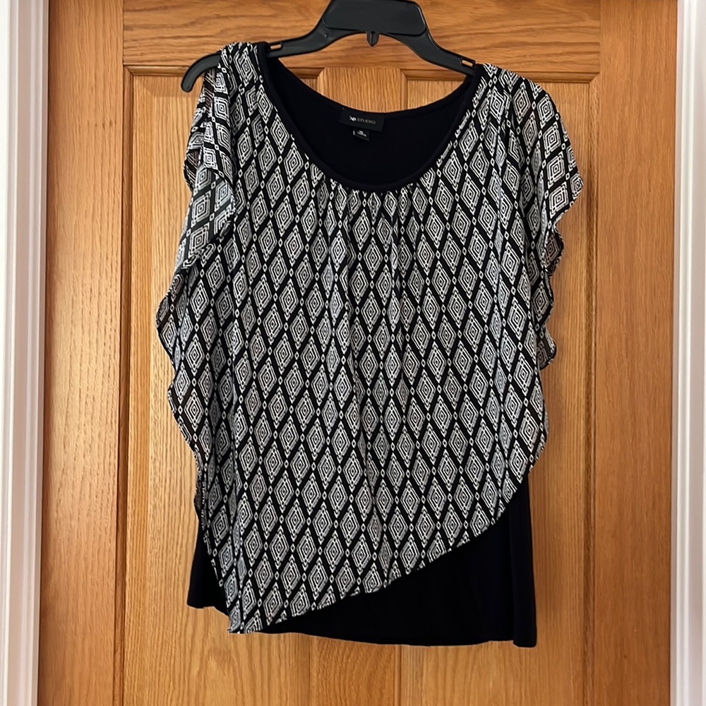 Like new asymmetrical top
